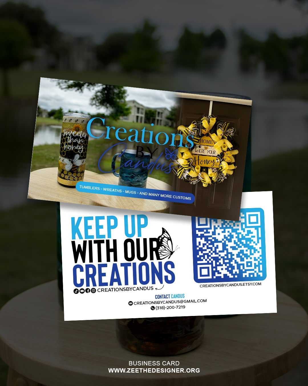 Business card with product images and QR code on a blurred outdoor background